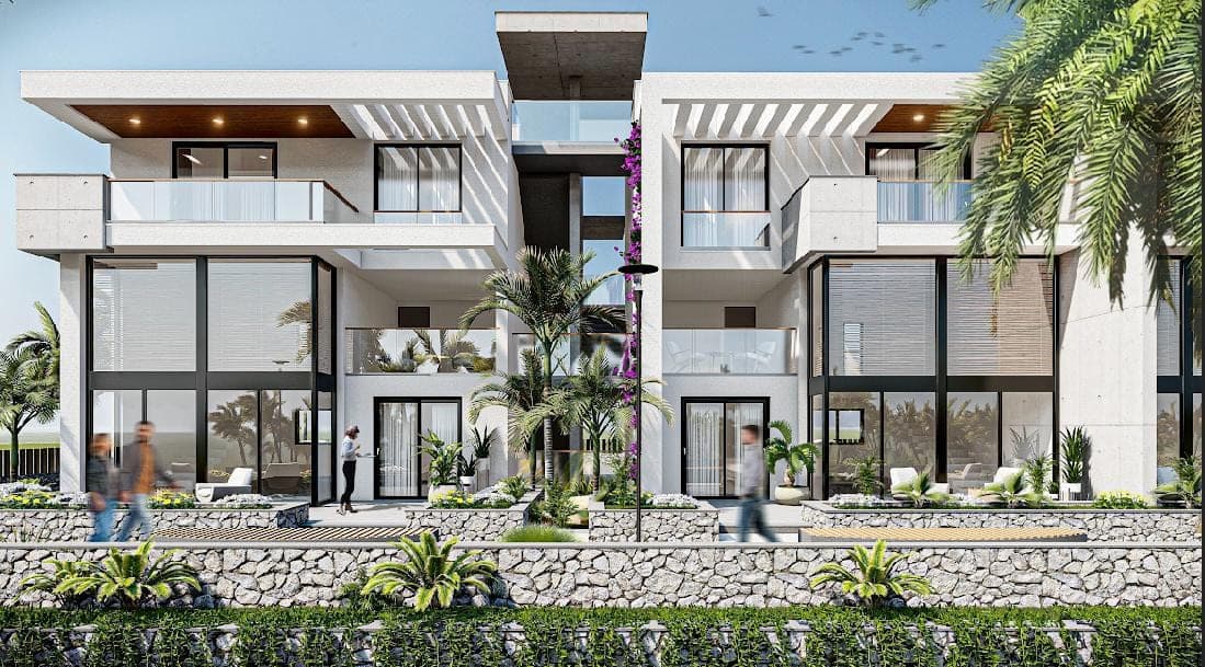 Modern tasarımlı apartman binasının ön cephesi ve peyzajlı ortak alanlar.