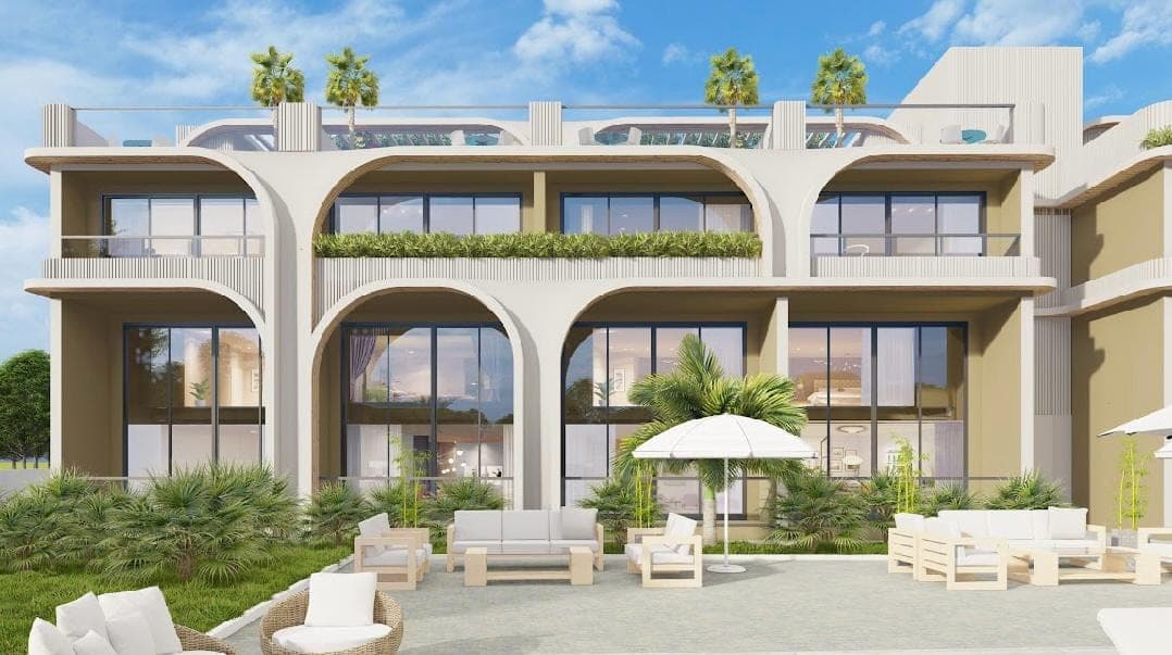 Modern mimariye sahip, havuzlu ve balkonlu apartman binası dış cephesi.