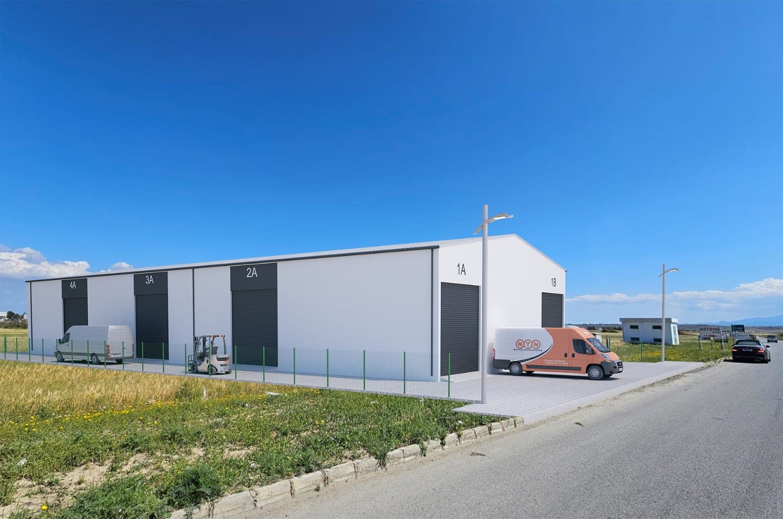 White-faced warehouse building with four doors and vehicles in front.
