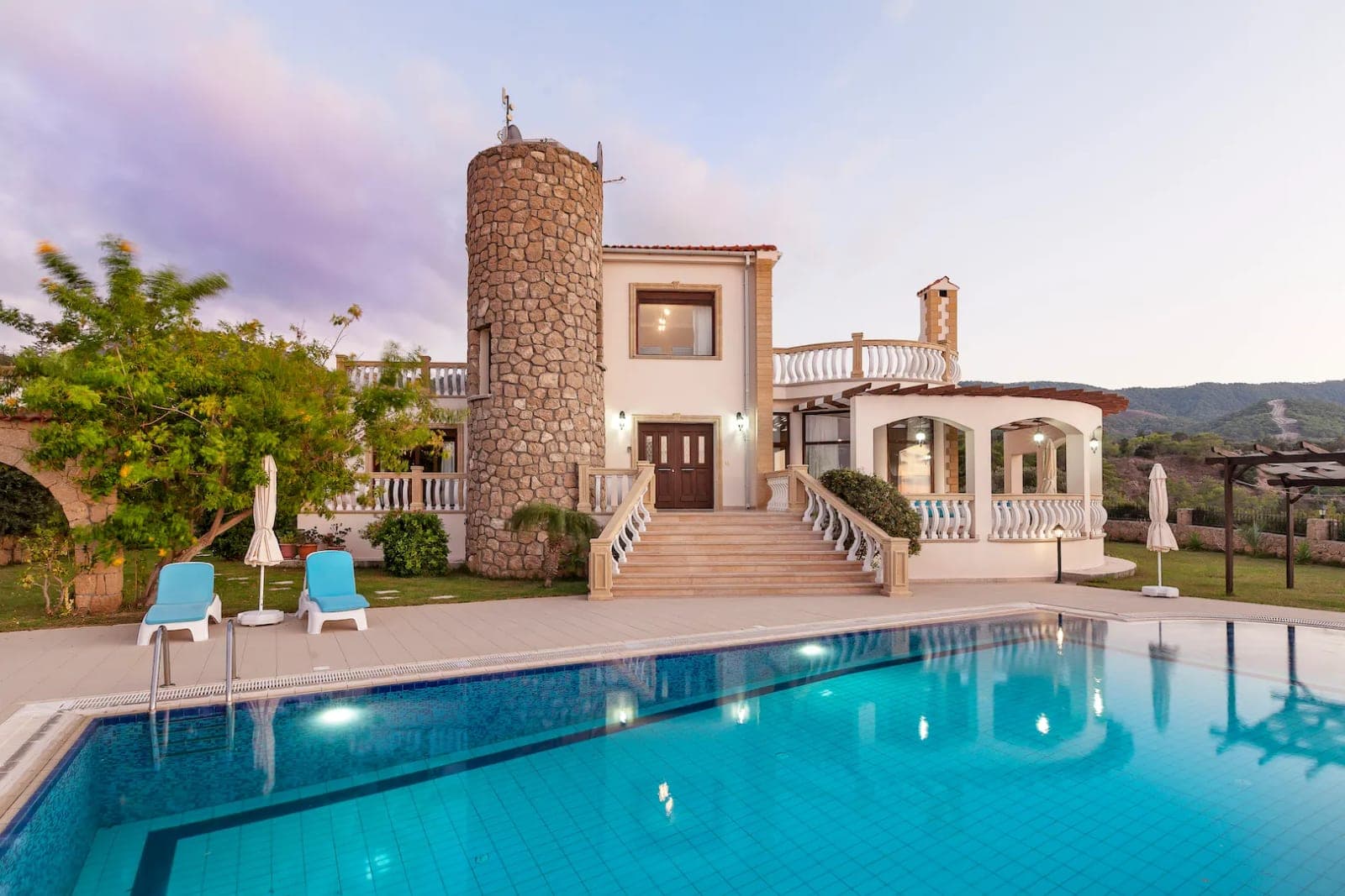 Stone-detailed villa with private pool and spacious garden area