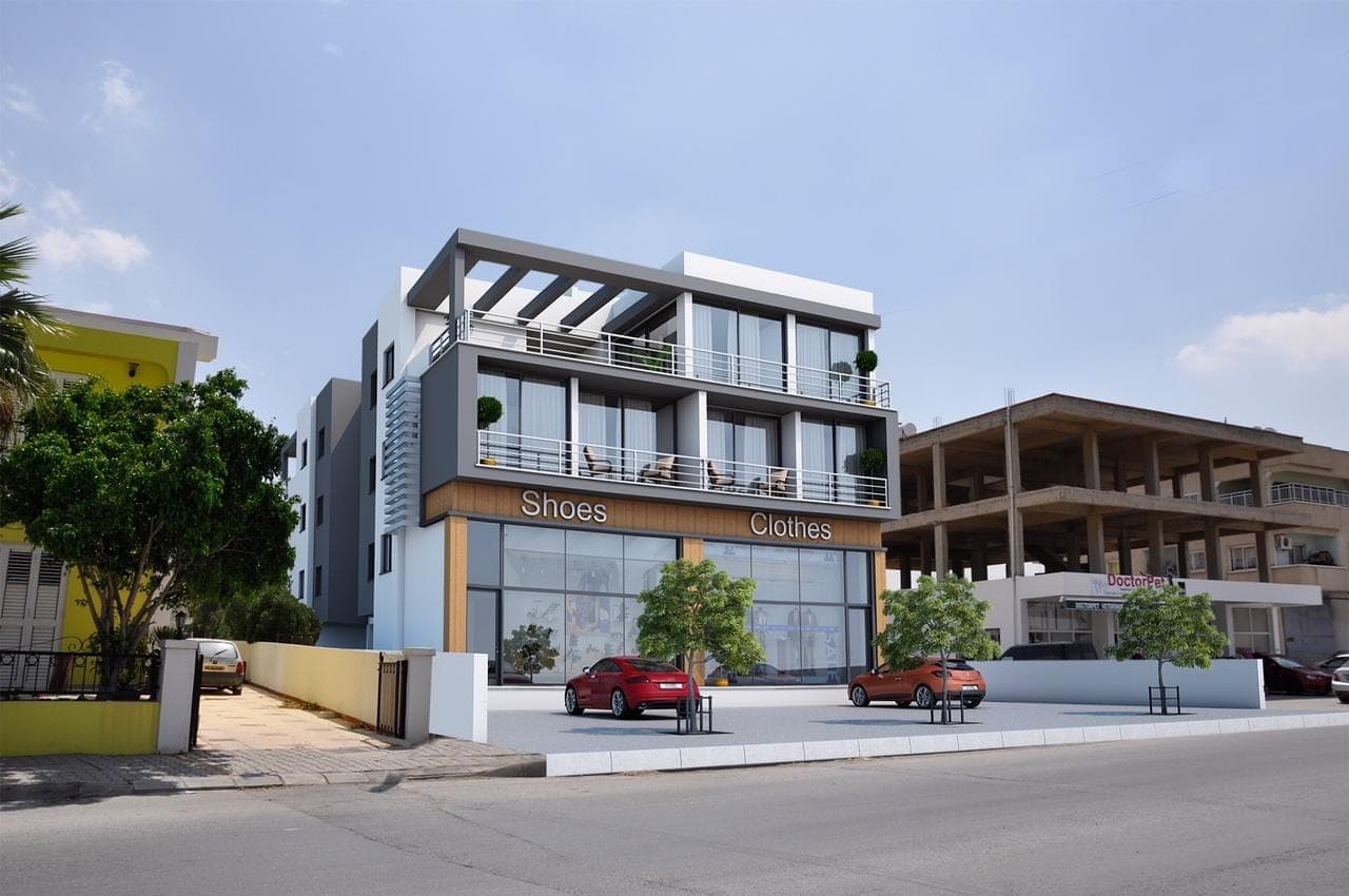 Modern designed new building exterior with balconies and parking