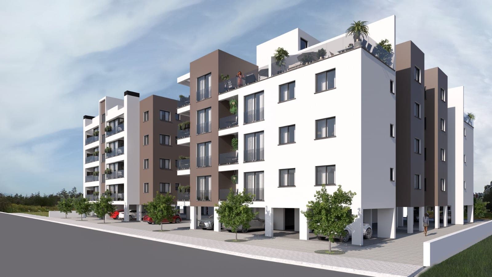Modern designed apartment blocks and open parking area