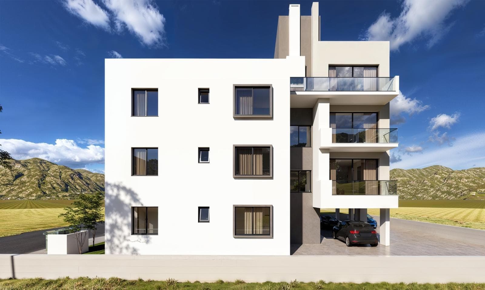 Exterior of a new building with modern architecture and mountain views.