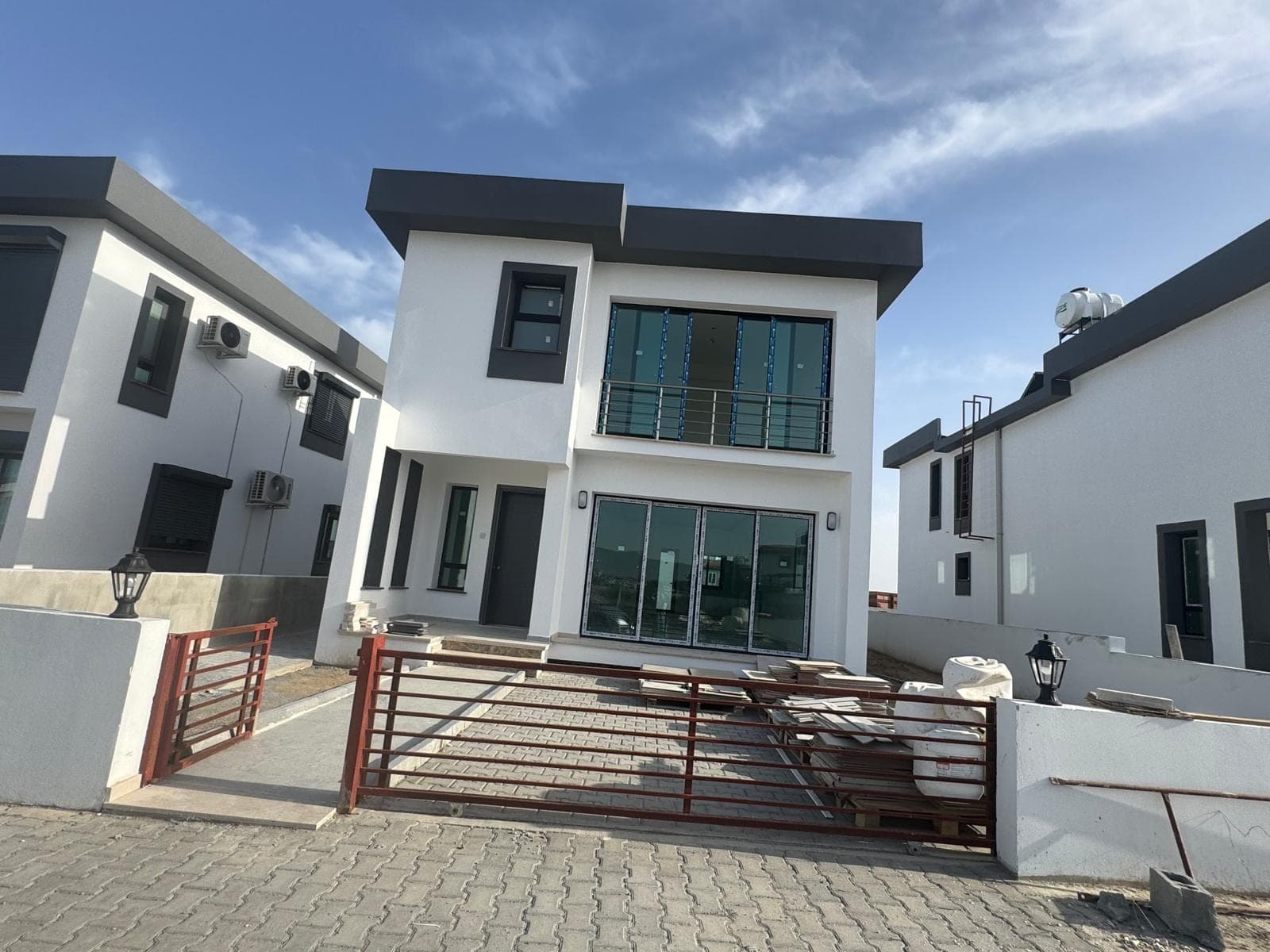 Villa with modern architecture and white exterior facade