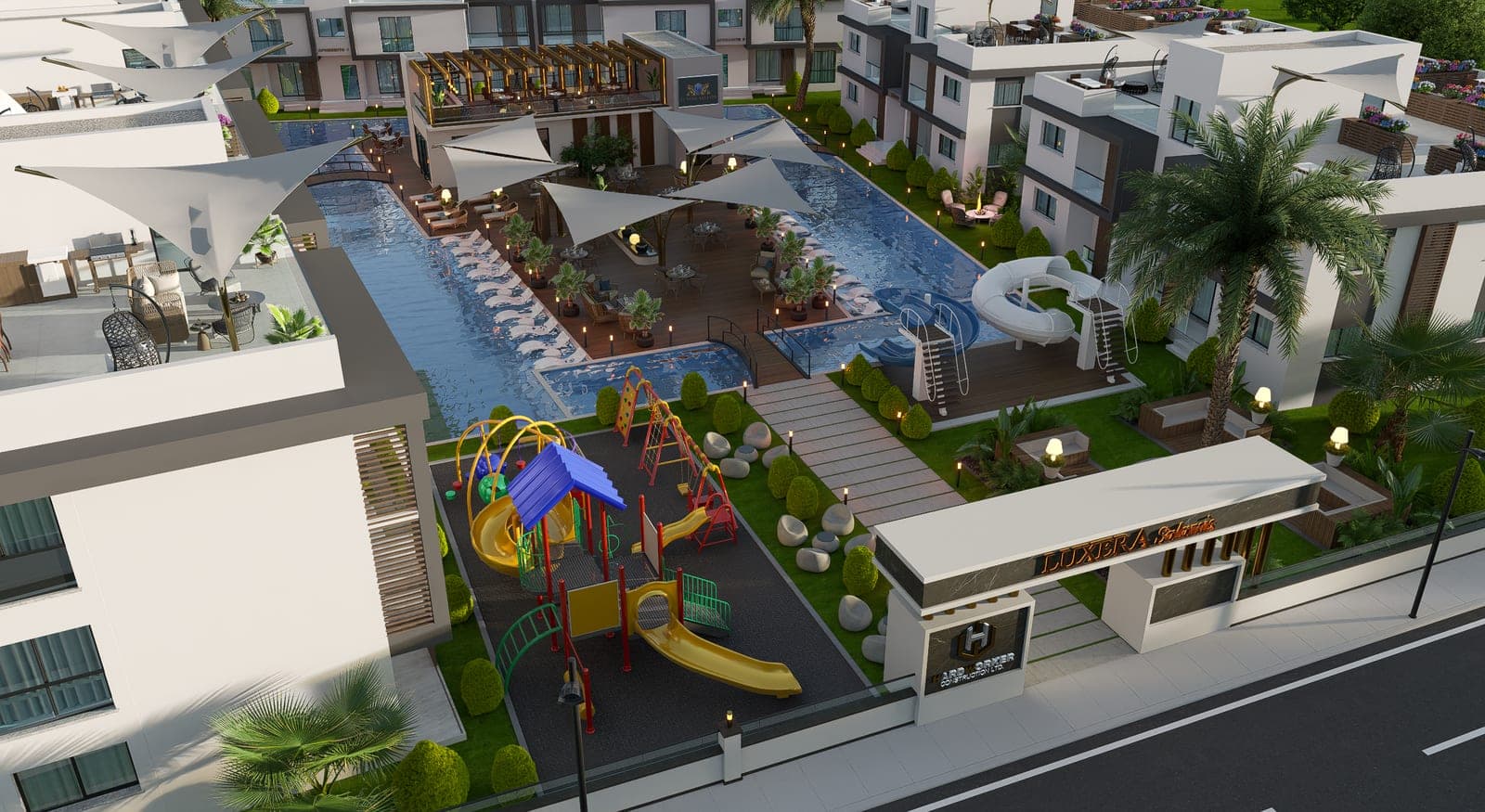 Overall view of the complex, pool, children's playground, and landscaped gardens.