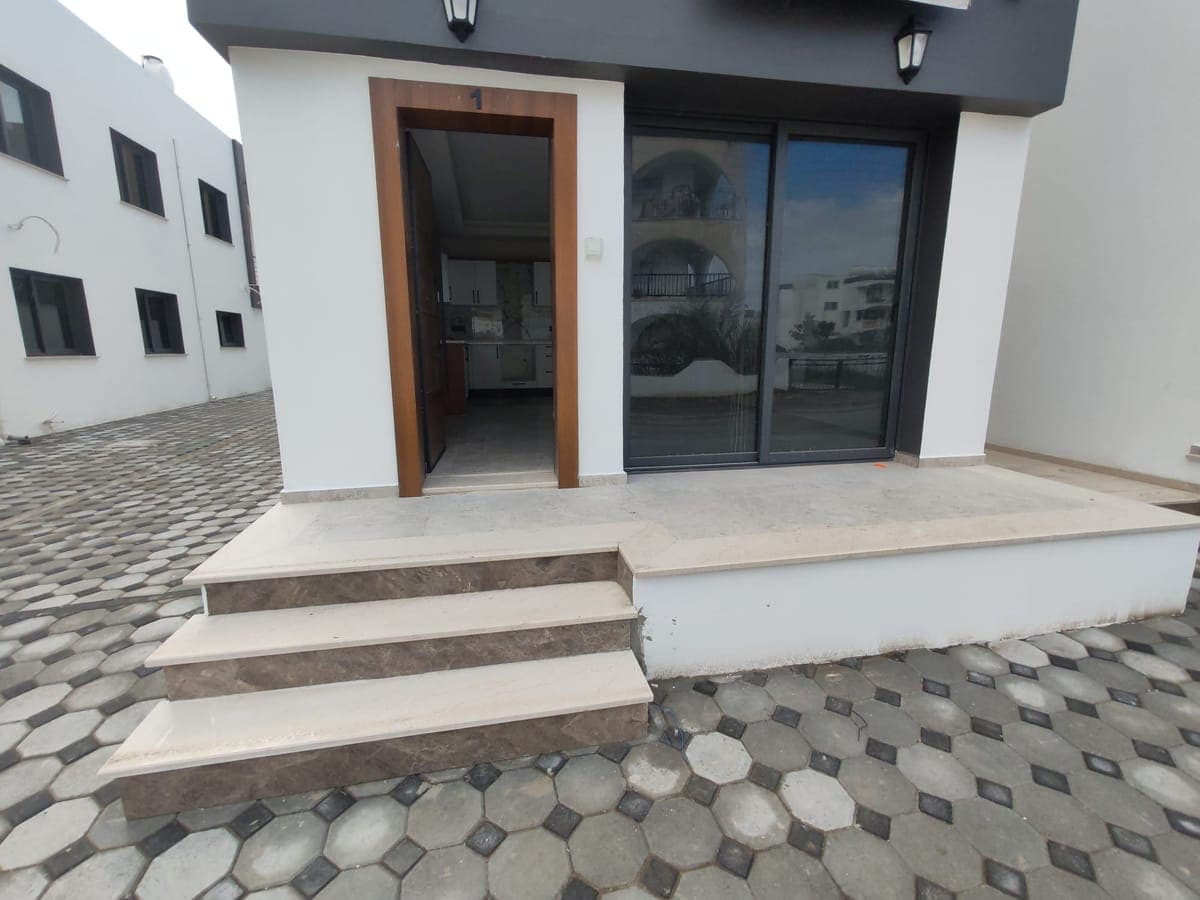 Exterior and entrance area of a modern detached house.