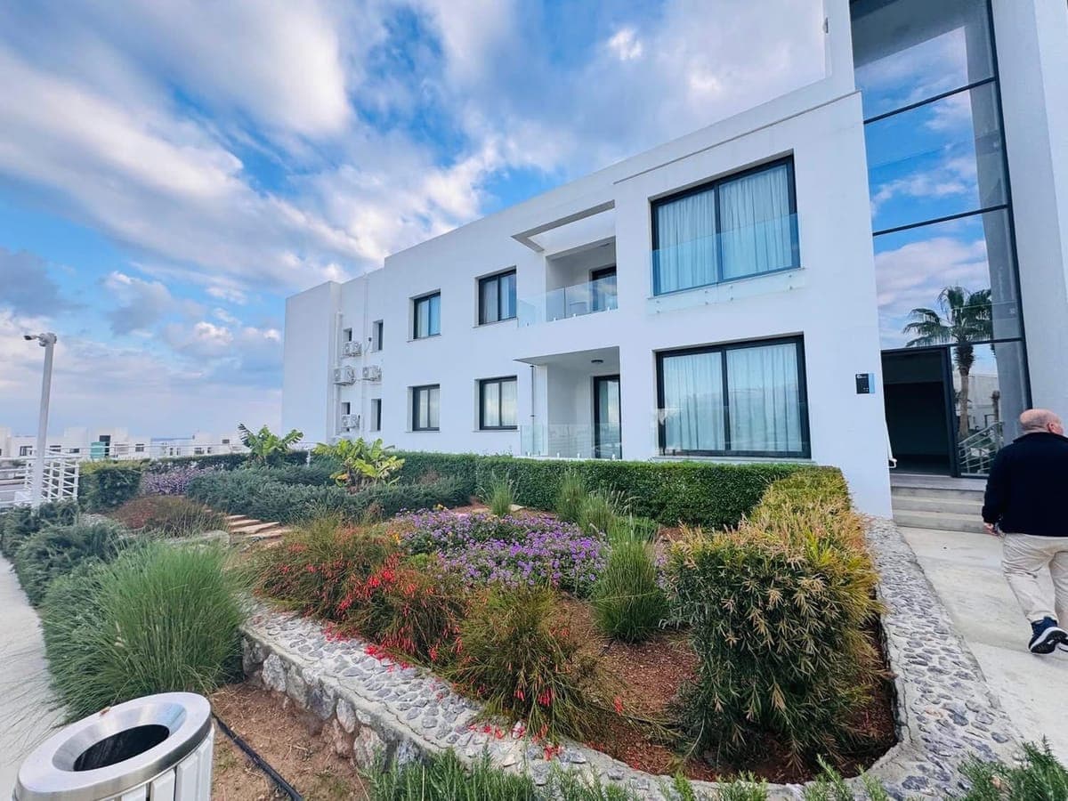 Exterior of a modern building with a landscaped garden